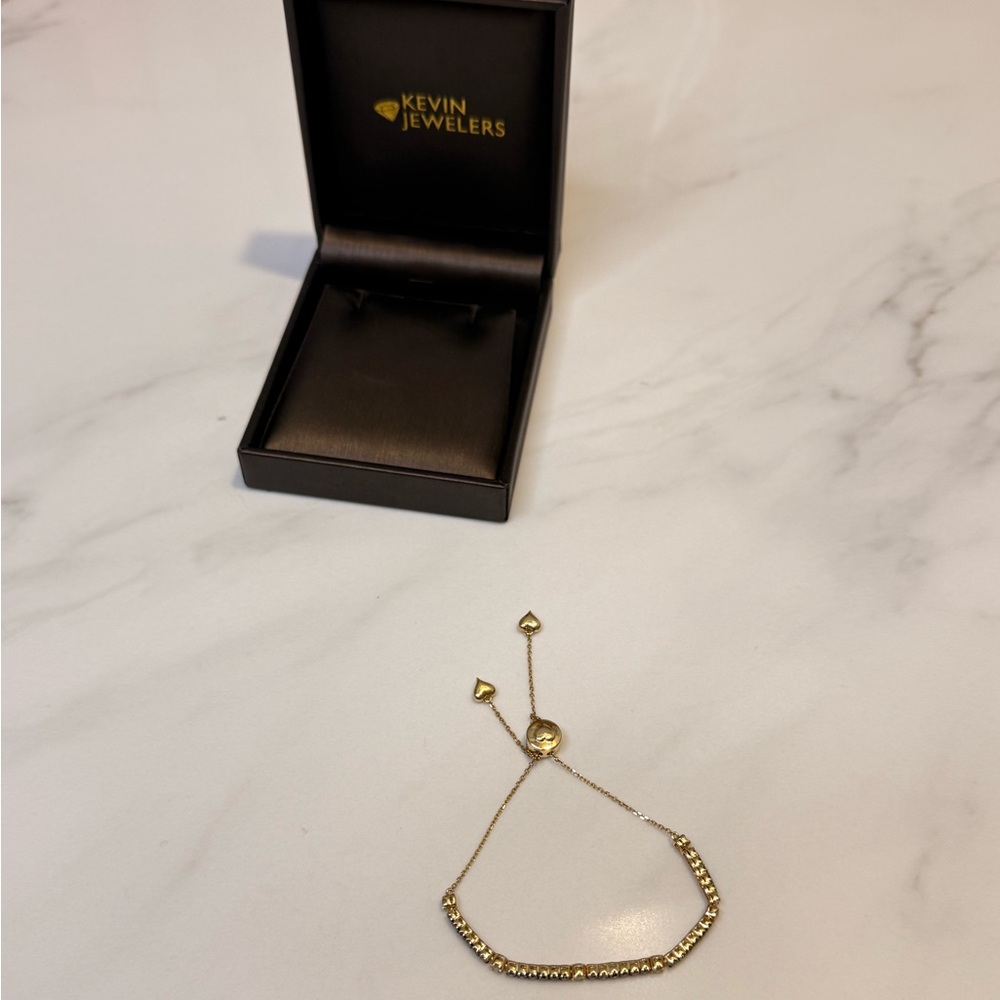 Kevin jewelers 14 karat rhinestone adjustable heart bracelet